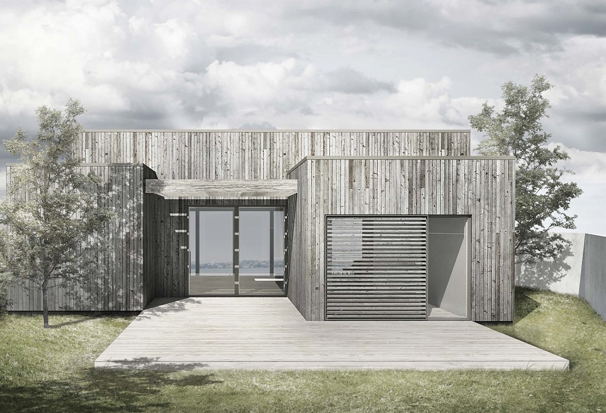 Sommerhus i træbeklædning ved kysten